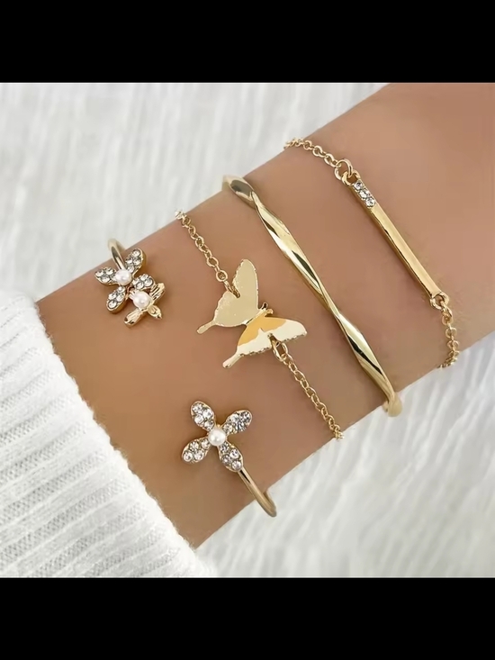 Anthropologie Jewelry - Gold Butterfly & Crystal Flower Layered Bracelet Set